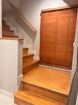 a stairway with wooden blinds and a wooden door at Modern 3 BR Villa Pool&Gym only 15min to Bang Tao Beach in Ban Phru Champa