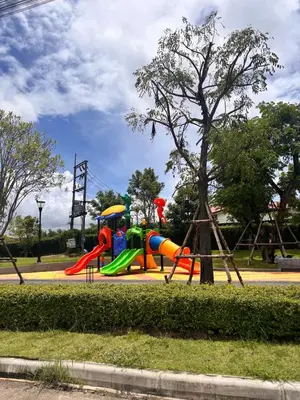 a playground in a park with a slide at Modern 3 BR Villa Pool&Gym only 15min to Bang Tao Beach in Ban Phru Champa