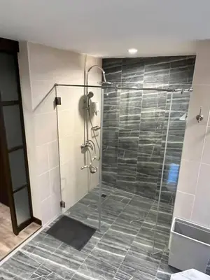 a bathroom with a shower with a glass door at Karon Beach Seaview Penthouse With Private Pool Condominium in Karon Beach