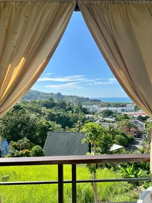 a view from the balcony of a house at Amazing Seaview House 2 Bedroom Patong in Patong Beach