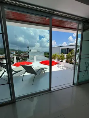 a view of a patio from a window of a building at Villa Rooftop in Ban Saiyuan (1)
