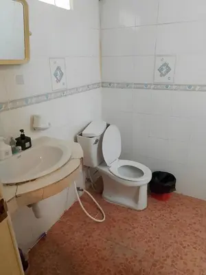 a bathroom with a toilet and a sink at xx GO INN Patong Beach Phuket - โก อินน์ หาดป่าตอง ภูเก็ต in Patong Beach