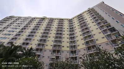 a large apartment building with many windows at No 498 SPD in Phuket Town