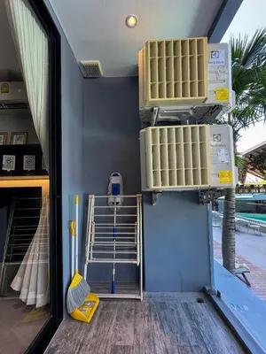 a room with two air conditioners on the wall at Kamala City Gate 1 Bdr Pool View in Kamala Beach