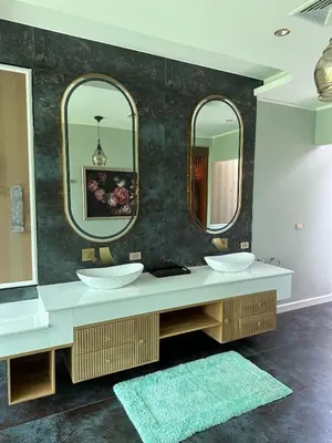 a bathroom with two sinks and two mirrors at Luxury Pool Villa Near Laguna - Gym, Jacuzzi & Cinema in Phuket