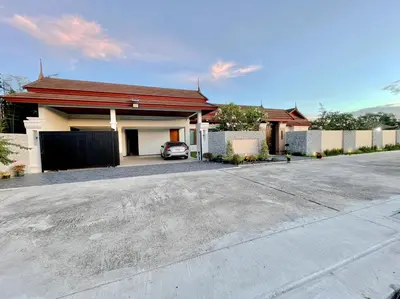 a car parked in front of a house at La Nissta Villa 4bdr pool Villa Phuket in Koh Lone