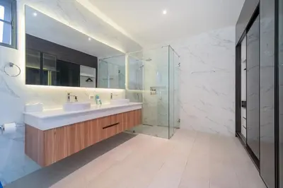 a bathroom with a sink and a glass shower at Nicky Villa Luxury Private Haven in BangTao Laguna in Laguna Phuket