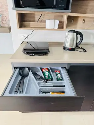 a drawer in a kitchen with utensils in it at Patong Elite Condo Nanai, Patong, Phuket in Patong Beach