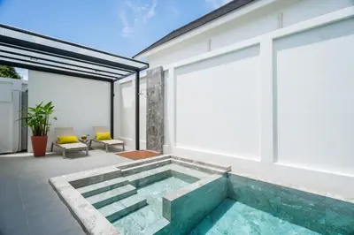 a pool in the backyard of a house at Villa Asteria Krabi - Luxury 3 Bedroom Pool Retreat in Ao Nang in Ban Khlong Haeng