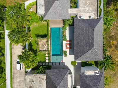 an overhead view of a house with a swimming pool at BangTao Luxury 5 Bedroom 1200sqm Modern Bali Style Holiday Villa Quiet and Private Large Private Pool Large Garden in Bang Tao Beach