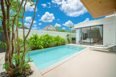 a swimming pool in the backyard of a villa at 4 Br Pool Villa in Chalong in Phuket Town