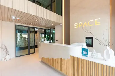 a store front with a sign that reads space at Brand new 1 BR apt 403 at Space Condo near Boat Avenue in Bang Tao Beach