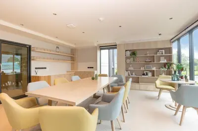 a dining room with a table and chairs at Brand new 1 BR apt 403 at Space Condo near Boat Avenue in Bang Tao Beach