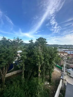 a view of a city with trees and a sky at FantaSea Kamala By Ere in Kamala Beach