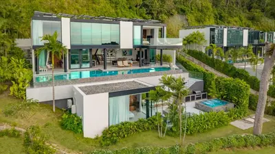 an aerial view of a house with a swimming pool at NEW Luxury 4BR Villa in Layan - Villa Zuma in Layan Beach