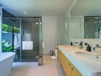 a bathroom with a tub and a sink and a shower at NEW Cozy 3BR Luxury Pool Villa - Villa Nova in Ban Pak Lak