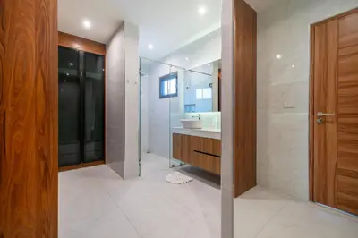 a bathroom with a sink and a mirror at Nicky Luxury Private Pool Villa in BangTao Laguna in Laguna Phuket