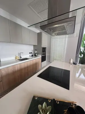 a kitchen with a sink and a counter top at Luxury Botanica Foresta 4 bed in Ban Phru Champa