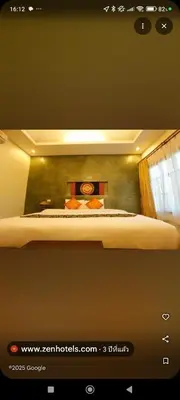 a picture of a bed in a room at Rawai Boutique Resort in Rawai Beach