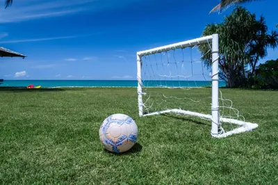 a soccer ball sitting in front of a goal at Villa Malee Sai in Ban Han Pa To