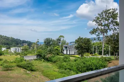 a house in the middle of a field at Seaview 1 BR Apt at VV Patong C301 near Freedom Beach in Patong Beach