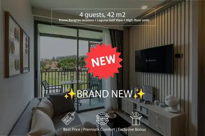 a new brand new living room with a couch and a tv at Bangtao Laguna Apartments in Laguna Phuket