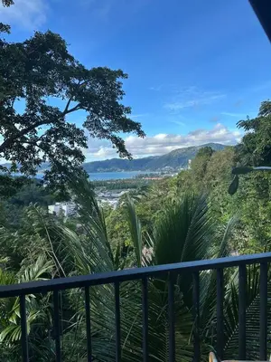 a view of the ocean from the balcony of a house at Maison Paradise Sea View in Patong Beach