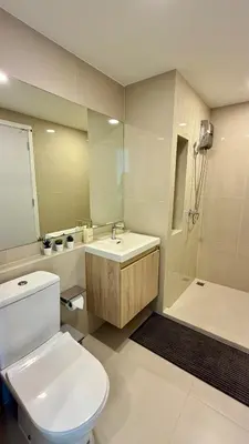 a bathroom with a toilet and a sink and a shower at Cozy apartments for a comfortable stay and accommodation in Phuket Town
