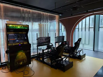 a room with two gaming chairs and a video game console at The Title Legendary Bang Tao - Modern 1BR Resort Apartment in Bang Tao Beach