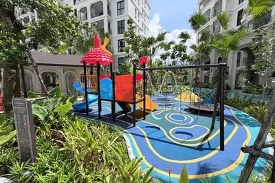 a playground in a park with a slide at The Title Legendary Bang Tao - Modern 1BR Resort Apartment in Bang Tao Beach
