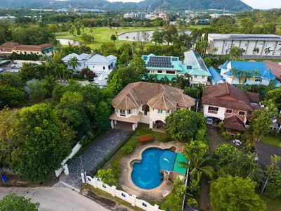 an aerial view of a house with a swimming pool at Golfer's Getaway 7 Bedroom Pool Villa (SV1) in Phuket Town