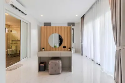 a bathroom with a vanity and a mirror on a wall at V258 2 Villas 2 Kitchens 2 Livingrooms Huge Pool in Rawai Beach