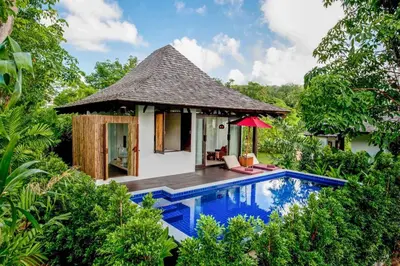 a villa in the jungle with a swimming pool at The Vijitt - Deluxe Pool Villa in Ban Saiyuan (1)