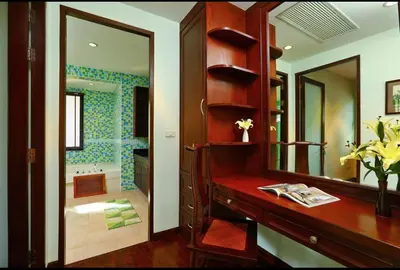 a bathroom with a vanity and a large mirror at Kamala Private Bliss Retreat 4 Bedrooms Villa in Kamala Beach