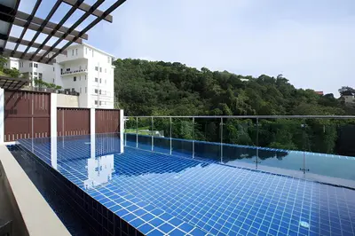 a swimming pool on the roof of a building at Sea View Pool Villa Grand Kamala Falls in Kamala Beach