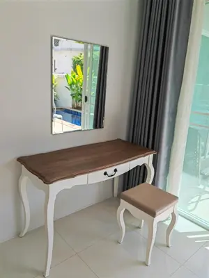 a dressing table with a mirror and a stool at Private Tropical Villa 2bdr Bangtao beach in Laguna Phuket