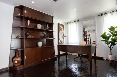 a room with a piano and a shelf with vases at 5 BR Villa Kalim 5 Private Pool with Seaview in Patong Beach