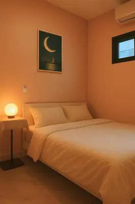 a bedroom with two beds and a lamp on a table at Dalbit Heaven #Patong Beach 3 min walk Super Private House 2BR in Patong Beach