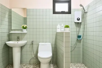 a bathroom with a toilet and a sink and a shower at Dalbit Heaven #Patong Beach 3 min walk Super Private House 2BR in Patong Beach