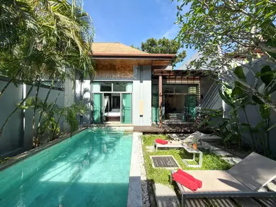 a swimming pool in the backyard of a house at Villa 2BD Nai Harn Beach by Mill in Ban Saiyuan (1)