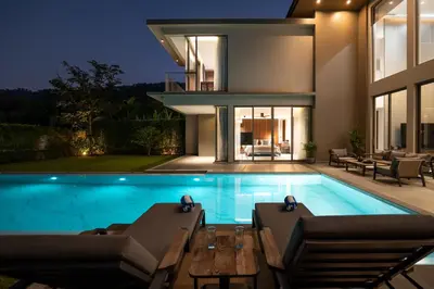a swimming pool in the backyard of a house at Grand View Lagoon - private paradise in Phuket in Ban Thalat Choeng Thale