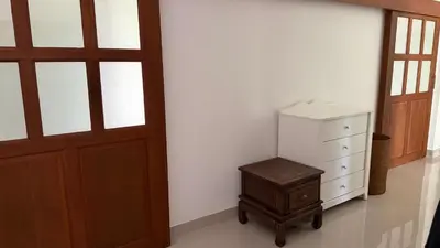 a room with a door and a dresser and a drawer at The Majestic Estate - 6 Bedroom Private Villa in Ban Bang La
