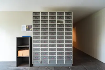a wall filled with lots of gray boxes at Bangtao Beach Tropical Holiday Retreat in Bang Tao Beach