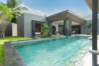 a swimming pool in the backyard of a house at Cocoon Villa 5 - Luxurious 3BR Pool Retreat near Naithon Beach in Nai Thon Beach