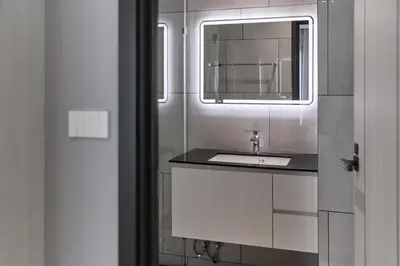 a bathroom with a sink and a mirror at Title Legendary, 1-BR, 45 sqm, 8 min to BangTao Beach in Bang Tao Beach