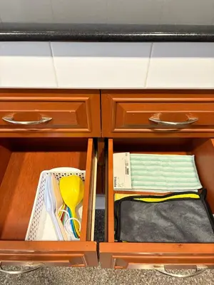 a wooden cabinet withartments with a drawer at RisaVilla Phuket - 4BR Pool Villa near Patong Beach in Patong Beach