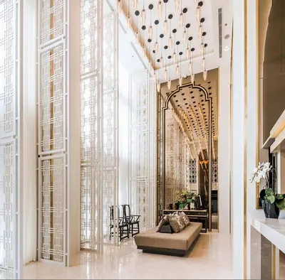 a lobby with a couch in the middle of a building at The Base Height in Phuket Town
