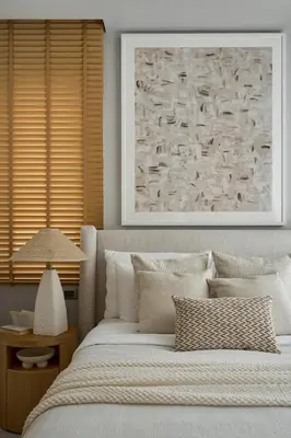 a bedroom with a bed with a picture on the wall at Premium Villa Botanica 3-BR with Pool and Garden in Ban Pak Lak