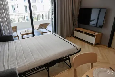 a hospital room with a bed and a flat screen tv at Brand New apartments, 60 sqm, BangTao beach in Bang Tao Beach