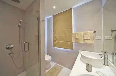 a bathroom with a sink and a toilet and a shower at Villa with private pool in Kamala in Kamala Beach